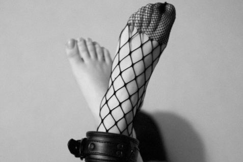 woman wearing mesh stockings